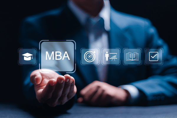 MBA or master of business administration program concept. Businessman holding virtual MBA icons for personal development.